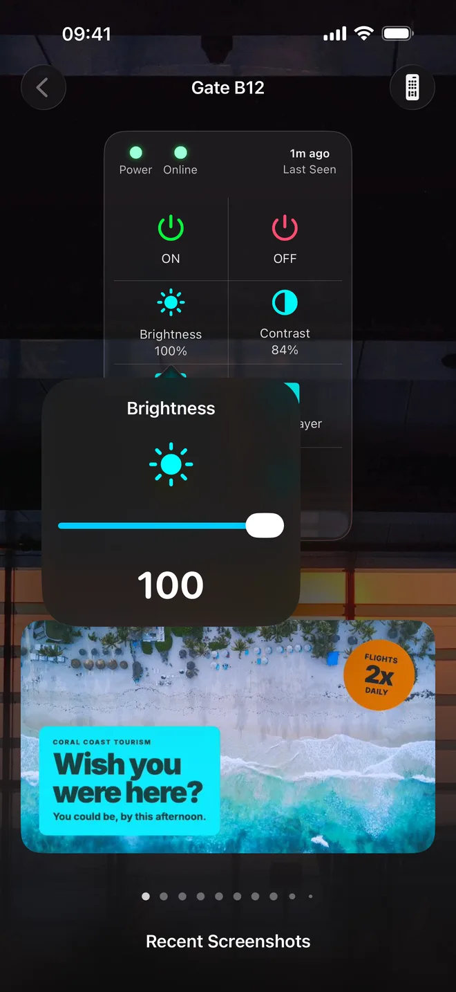 A brightness slider open over the remote, set to 22.